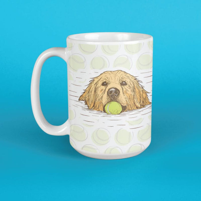 mug with illustration of a dog with a tennis ball in water