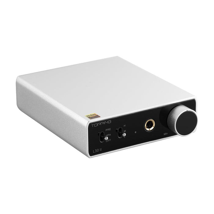 The Topping L30 II by Topping is a compact silver and black headphone amplifier with a large volume knob, front-panel input/output jacks and switches, and an advanced NFCA module for high-fidelity audio.