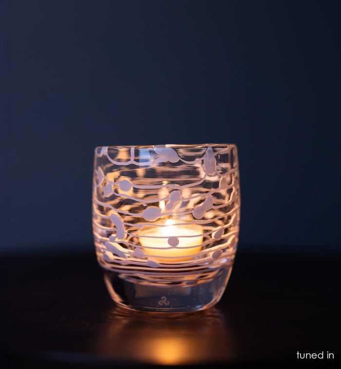 tuned in |clear white white strings wrapped around hand-blown glass candle holder