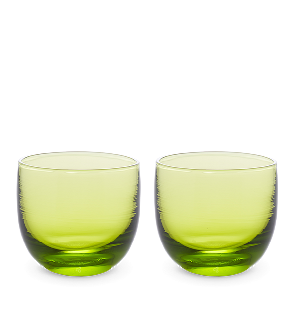 twist drinker set, two transparent lime green, hand-blown drinking glasses.