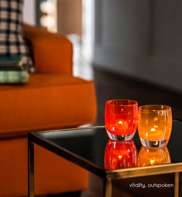 vitality, bright blood-orange, hand-blown glass votive candle holder.