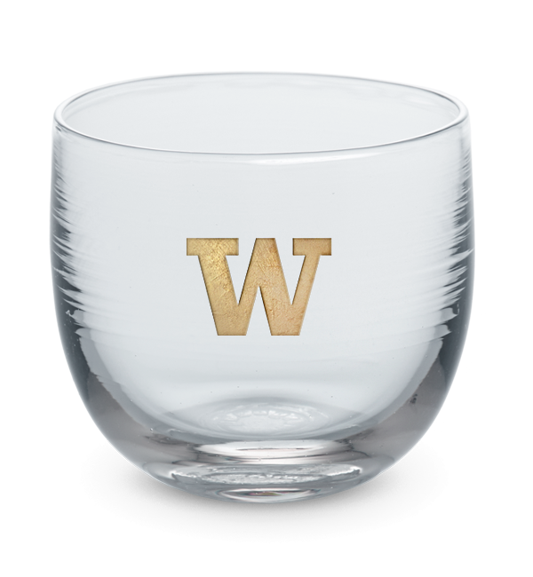 Washington drinker, clear hand-blown stemless wine glass with University of Washington logo hand-etched in gold.
