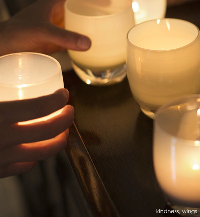 wings, tan grey, hand-blown glass votive candle holder. Paired with kindness.