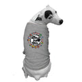 A dog with a gray dog shirt with a "World Pup 2026" soccer graphic centered on its back
